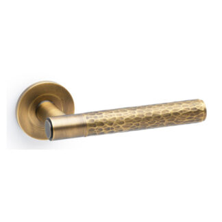 Alexander & Wilks AW223IB Spitfire Hammered Lever on Round Rose - Italian Brass (LEAD TIME: 2-3 DAYS)