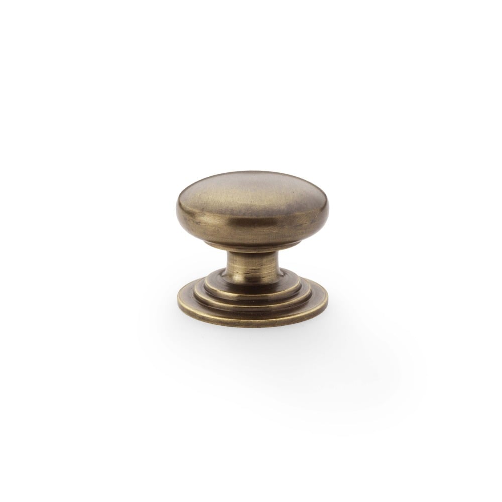 Alexander & Wilks AW825-32-AB Waltz Round Cupboard Knob On Stepped Rose - Antique Brass Knob 32mm (LEAD TIME: 2-3 DAYS)